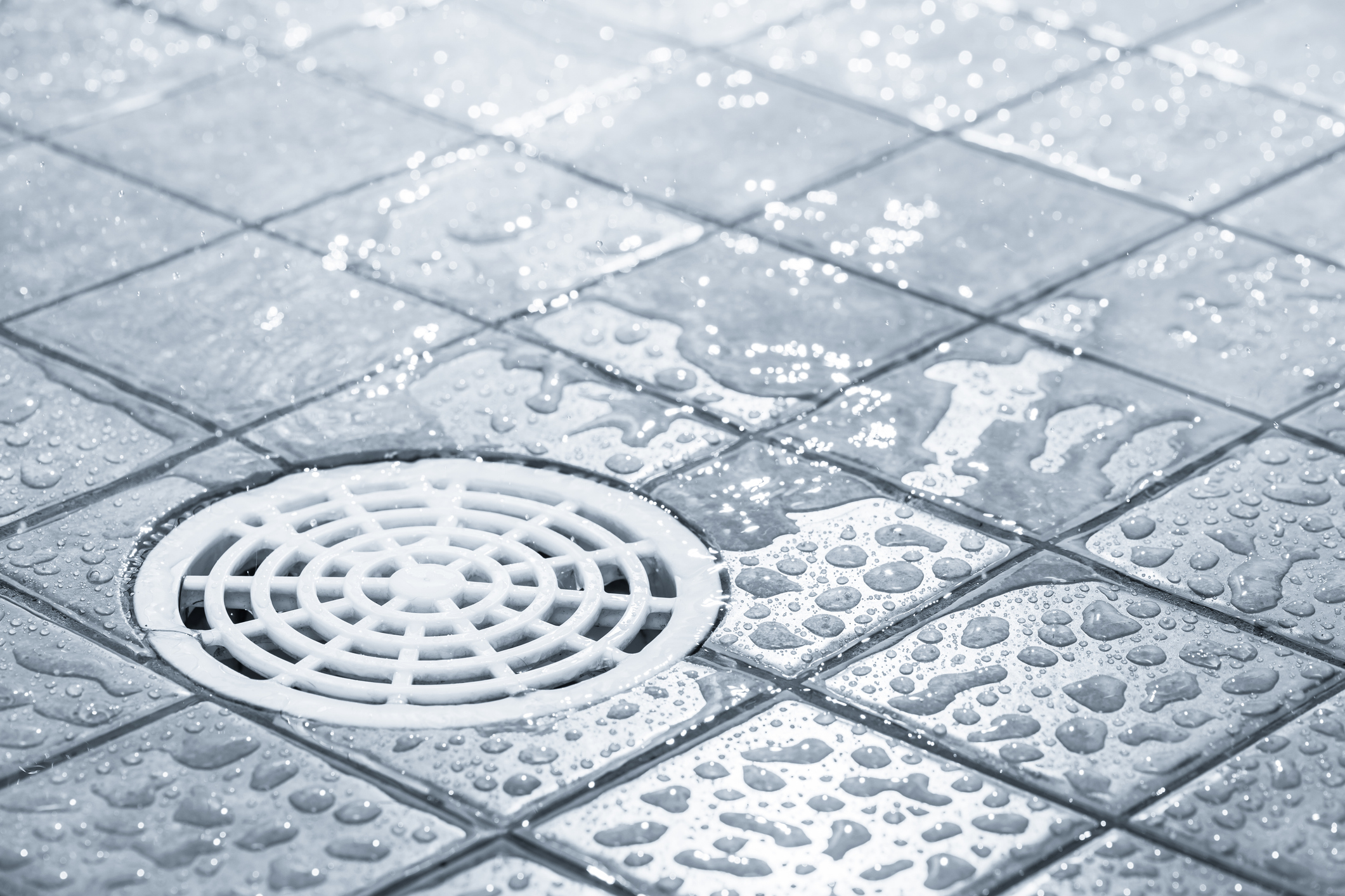 Shower Drain with Water Spraying on it